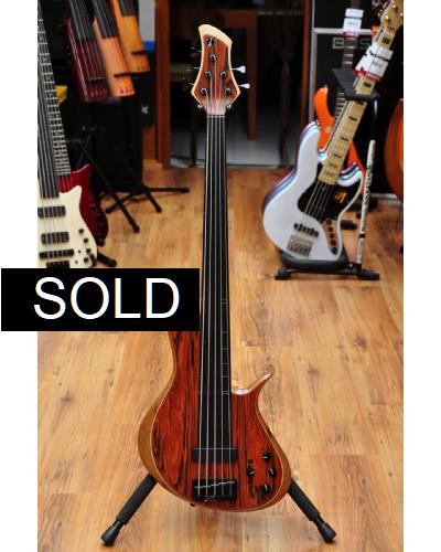 Meridian Horizon 5 Fretless Cocobolo top